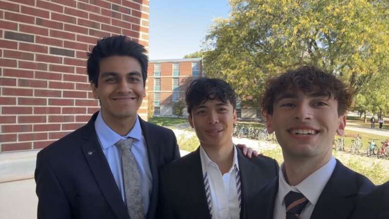 Moksh, Arrazi, and Tristan suited up at the Wells Fargo case competition